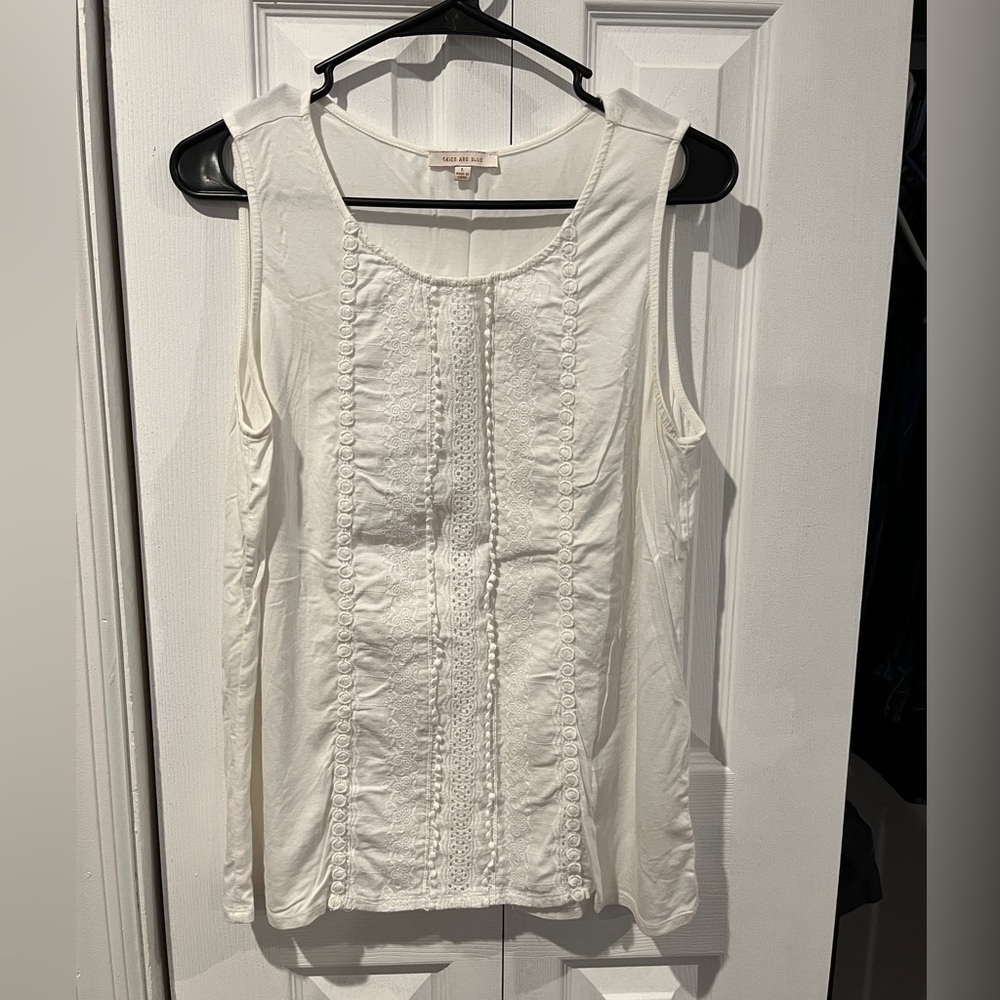 White Sleeveless Top